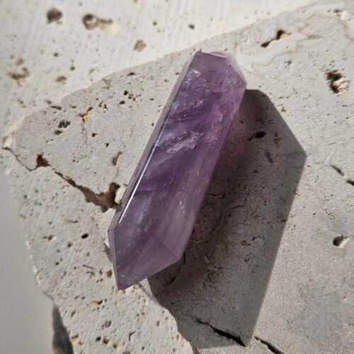 Amethyst double terminated point seen from another angle, showing a point at each end