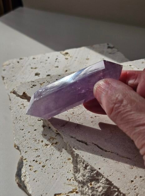 Amethyst Double Terminated 3 Amethyst double terminated point held in the hand to show its size