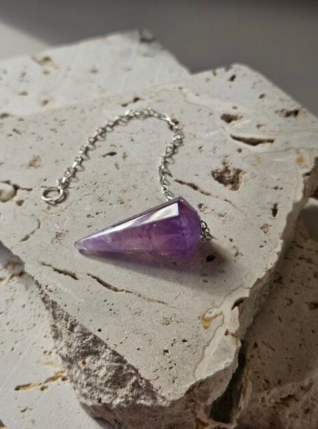 Amethyst Pendulum 4 Faceted Amethyst pendulum on a silver chain, full piece in frame