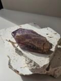 Bahia Amethyst point showing the warm brown and rust tones at its base