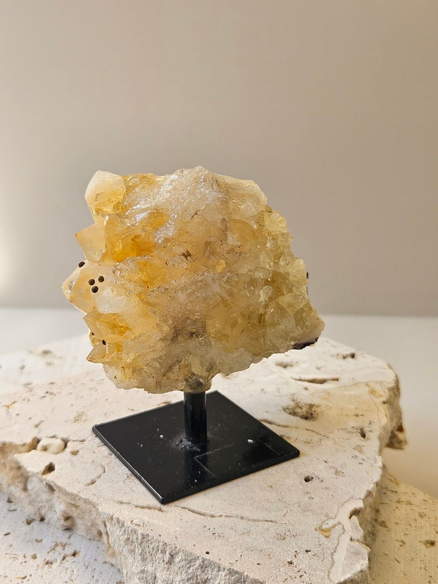 Citrine Cluster on Stand 3 Citrine cluster raised on a stand, front facing