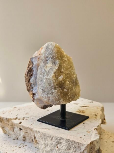 Citrine Cluster on Stand 4 Citrine cluster on its stand, seen in side profile