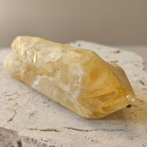 Bahia Citrine point in side profile showing its full length