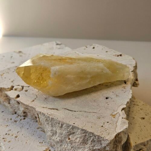 Citrine Point Bahia 4 Bahia Citrine point on a cream surface, front facing