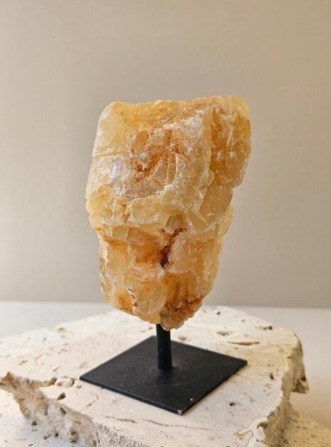 Citrine on Black Stand 3 Rough Citrine on its stand, turned to a three quarter angle