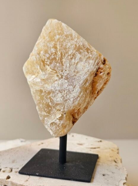 Citrine on Black Stand 4 Rough Citrine on its stand, side profile