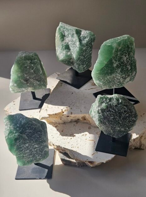 Green Aventurine Rough on Stand 6 Five rough Green Aventurine pieces on their stands, seen from above
