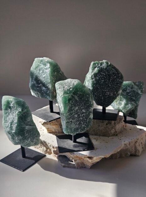 Green Aventurine Rough on Stand 7 Five rough Green Aventurine pieces on their stands, low front angle