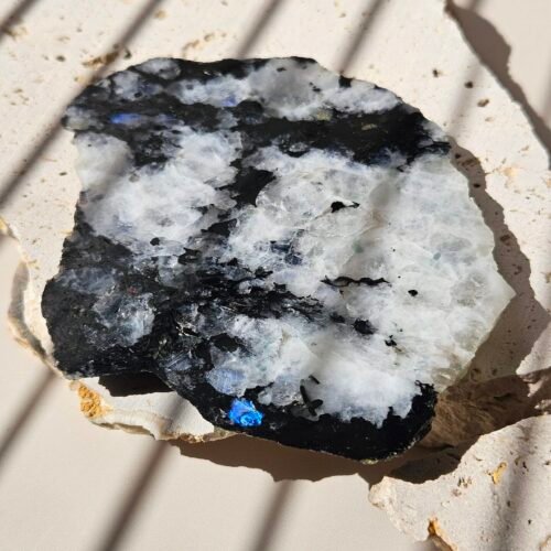 Polished Rainbow Moonstone slab showing blue flash across the surface