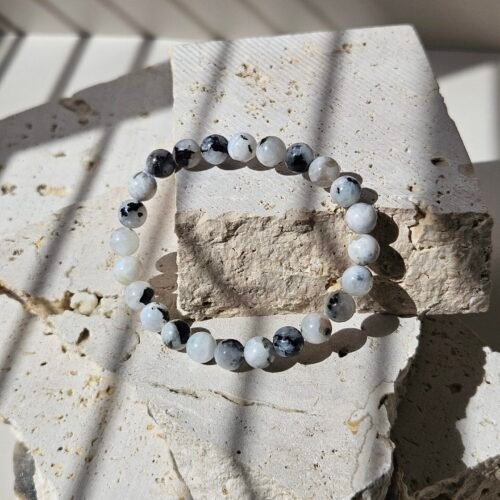 A single Rainbow Moonstone bracelet on stretch cord